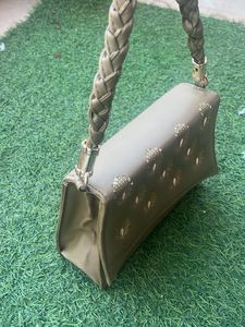 Elegant Clutch with Peacock Detail