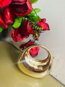 Gold Handbag with Unique Handle