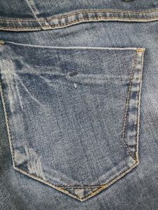 Distressed Denim Jeans
