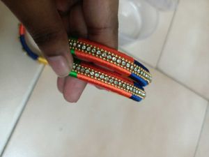 2 Sets Of Multi Colour Thread Bangles