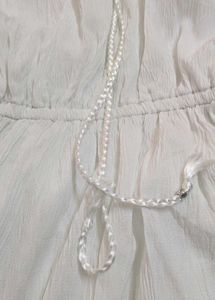 White flare beach vibe gown