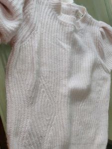 light pink sweater for cozy winters.