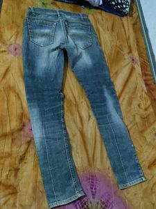 Ripped Blue Denim Jeans