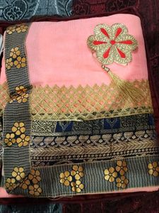 Elegant Peach Saree with Floral Border