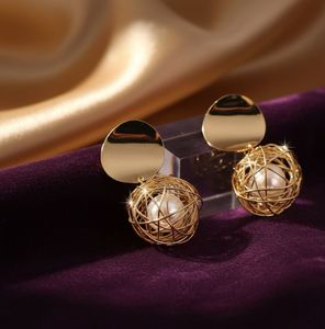 Elegant Gold Caged Pearl Drop Earrings