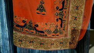 Elegant Orange Embroidered Saree