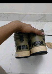 Stylish Puma high-top sneakers