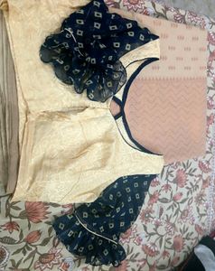 Golden Saree with Beautiful sleeve and back blou