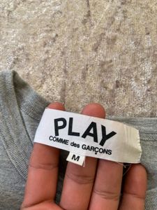 Cdg play big heart logo