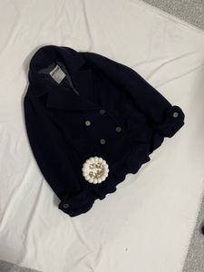Chic Navy Peacoat with ruffle