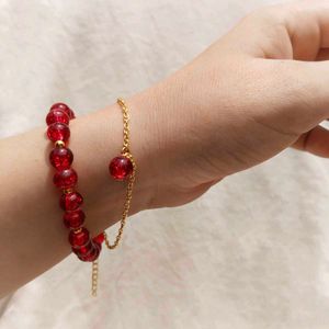 Red Beaded Bracelet with Gold Chain
