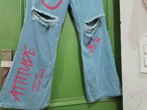 Ripped Jeans with Graffiti