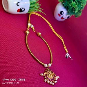 Elegant Gold-Toned Necklace with Pearl Accents