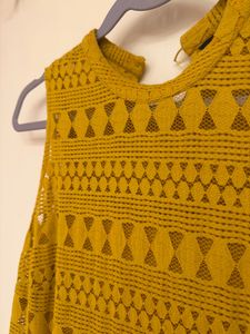 Sleeveless high neck top with slip