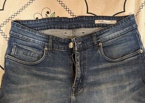 Distressed Denim Jeans