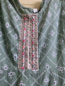 A Green Frock Type Top With Size XXL