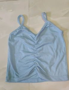 A Blue Crop Top With Crochet