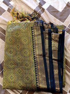 Saree With Black And Golden Border