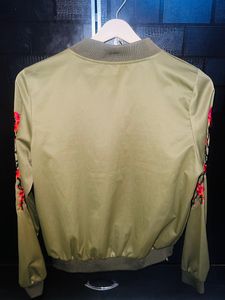 Olive Green jacket.