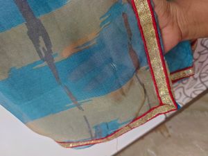 Pretty Blue Saree With Bright Red Border