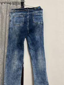 Ripped Blue Denim Jeans