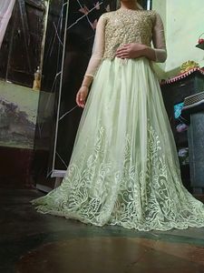 Heavy Embroidered Net Party Wear Long Gown With Du