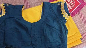 Elegent Yellow Saree With Tale Green Blouse