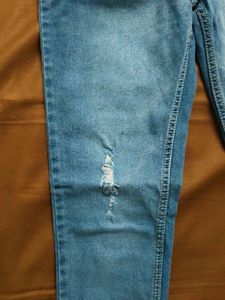 Distressed Denim Jeans