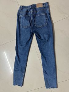 Ripped Knee Denim Jeans