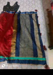 beutiful maroon saree with sleeveless blouse