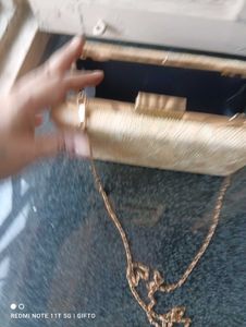 Party Wear Clutch. . Ligt Gold