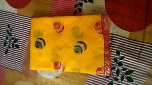 Yellow colored Matka Georgette Saree