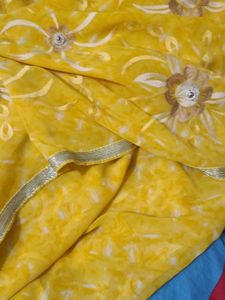 Yellow Saree with beautiful Flowers
