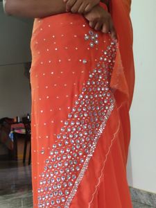 Orange Saree With White Stone Work