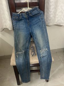 Ripped Knee Denim Jeans