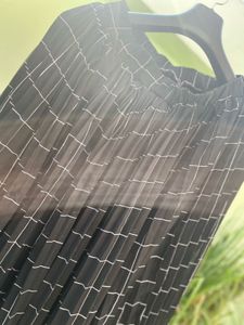 Pleated Checkered Skirt