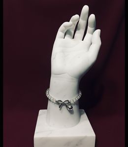 Crystal Bead Bracelet with Bow Charm