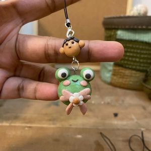Froggo and a boy clay Charm
