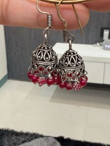 Silver Jhumka Earrings with Red Beads