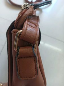 Blue and Brown sling bag
