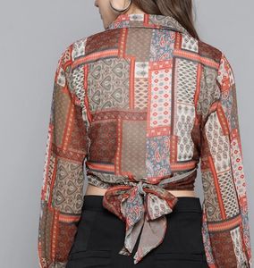 Geometric printed wrap crop top