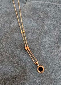 Rose Gold Roman Numeral Pendant Necklace