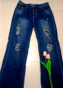 Ripped Flared Leg Jeans