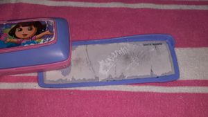 A pencil box with white board