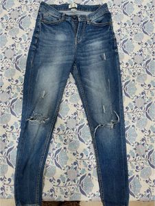 Ripped High-Waisted Jeans