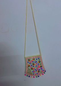 Embroidered Sling Bag with Tassels