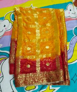 ghat chola bhandhej red and yellow saree