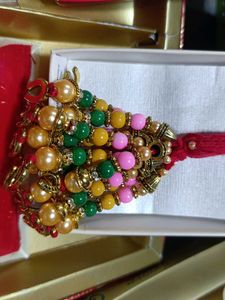 Decorative Beaded Lumba Rakhi For Bhabi 70/- Each