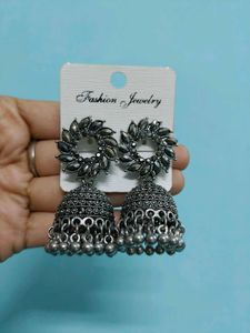 Silver Jhumka And Golden Diamond Earrings