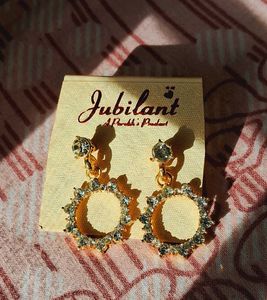 White stoned gold plated earrings